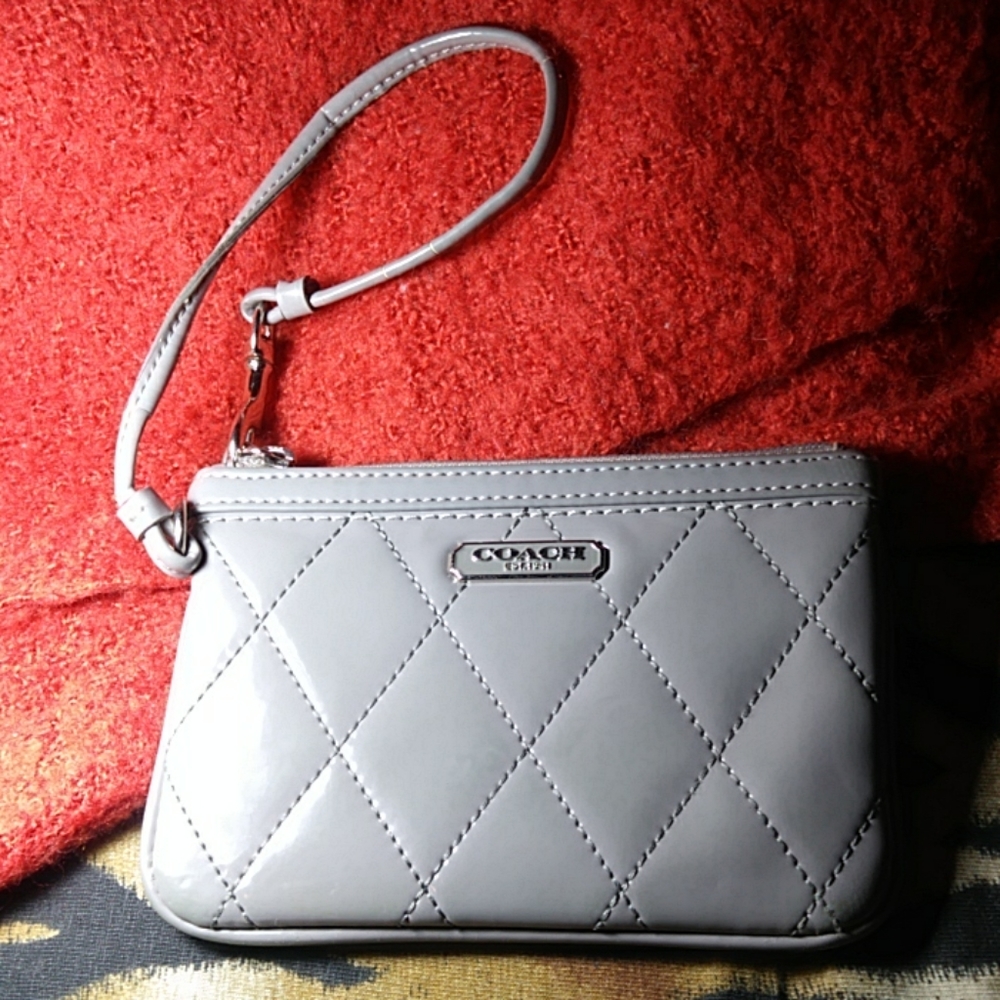 Coach gray wrislet wallet w/patent finish